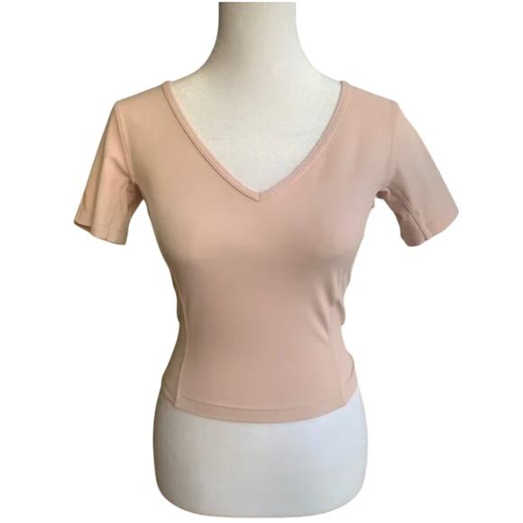(4) $68 Lululemon Nulu Cropped Slim Yoga Short Sleeve Pink Mist - Picture 5 of 8